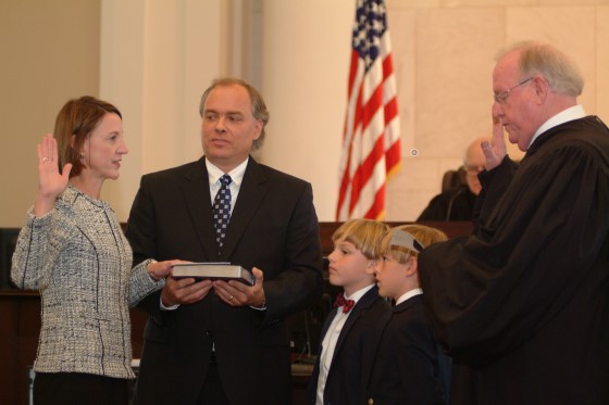 Judge Emily C. Marks was worn in by her father. Photo by Paul Robertson.