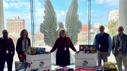 Judge Huffaker and chambers staff with Toys for Tots offerings