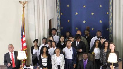 Judges and students photographed behind the bench