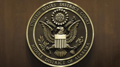 ALMD seal on courtroom wall