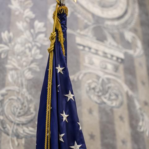 The U.S. flag in front of a courtroom niche