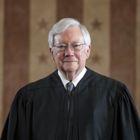 Judge Albritton, standing