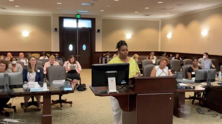 Conference attendees in courtroom seminar